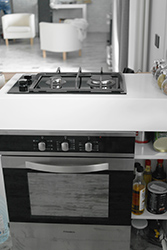 There's enough useful space to store things you might need to prepare food yet they are concealed from sight normally.