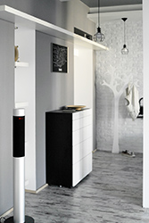 View to the entrance with custom designed chest of drawers.